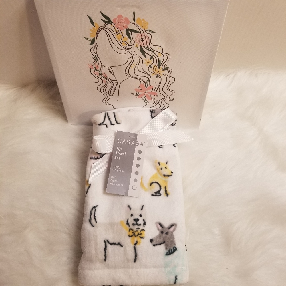 This a very cute tip towel set with cute dog prints